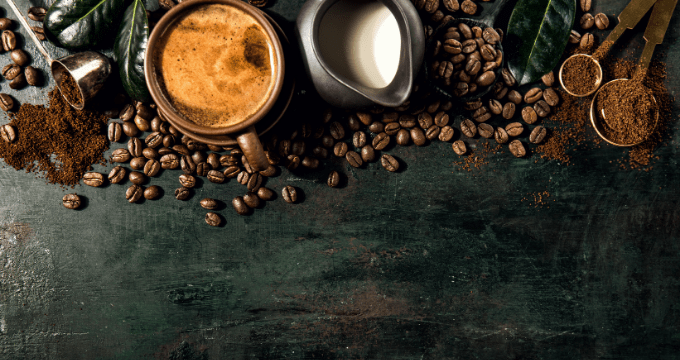 coffee grinder for french press - a selection of beans and coffee making equipment on a worktop